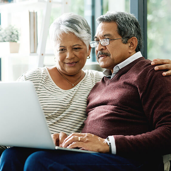 senior couple at computer