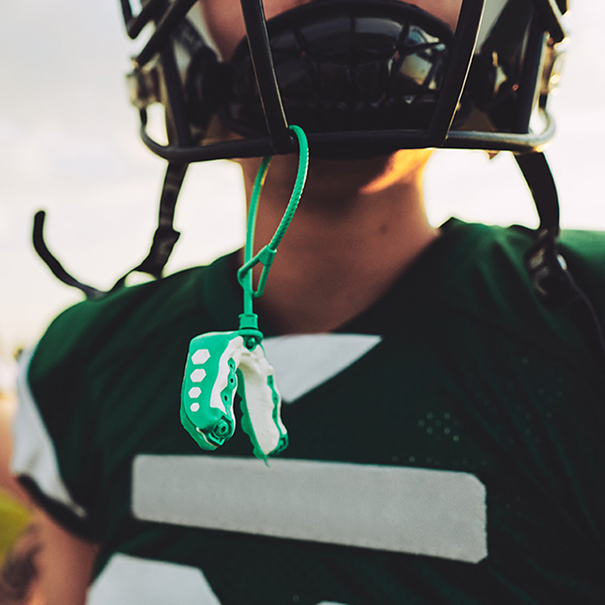 football player with mouthguard