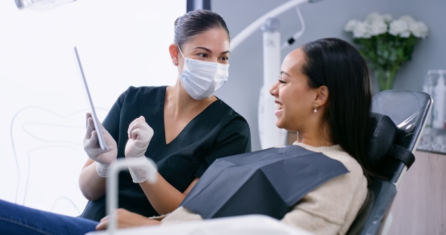 dental membership plan, explaining to a patient in dental chair